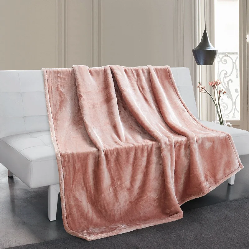 Fleece blankets for a cozy and plush textureFleece blankets for a cozy and plush textureThesis Home Oversized Solid Velvet Throw