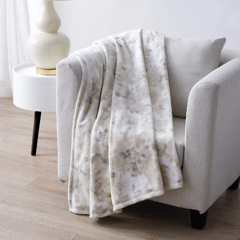 Chenille blankets with a thick and fuzzy textureChenille blankets with a thick and fuzzy textureTahari Home Biscay Taupe Floral Printed Plush Throw
